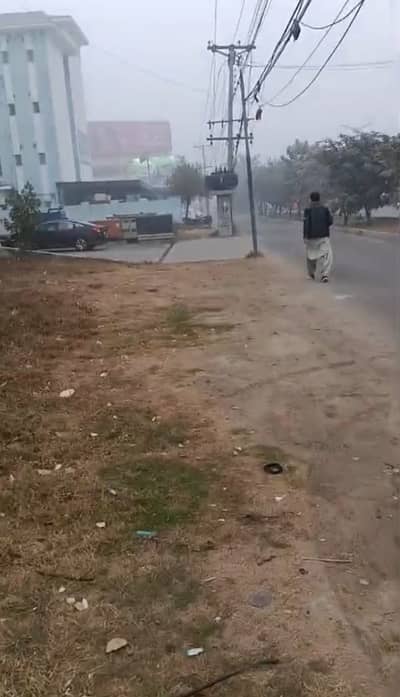 2 Kanal Commercial Land available for Sale Life Time Commercial Paid Location Khayaban e Junnah road Johar Town Lahore