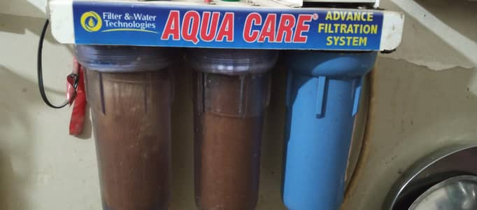 aqua care water purifier with triple purifying bottles
