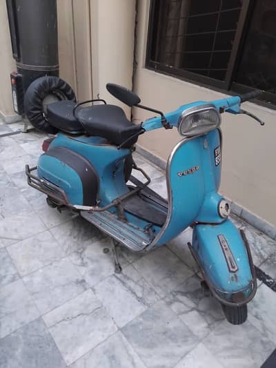 Scooter vespa in blue colour for sale