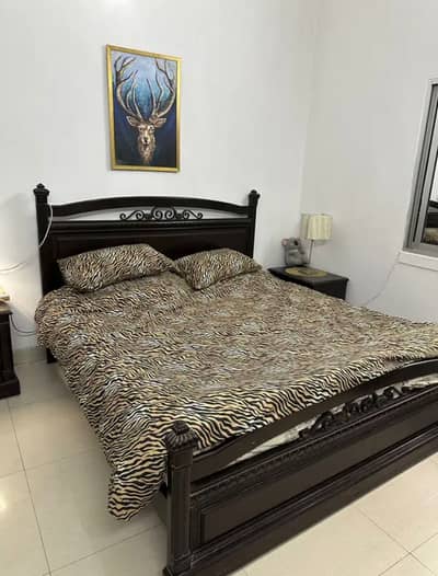 Bed with dressing and two side tables