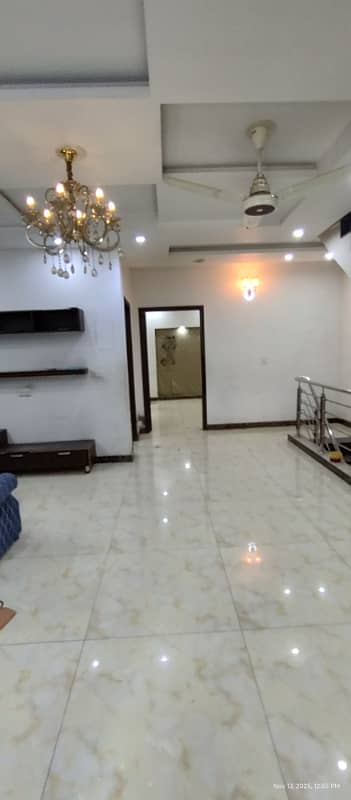 5 Marla 5 beds tripple story house 1. . . 2. . . 2. . near ucp tile flooring neat and clean