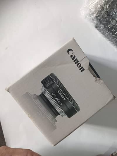 Canon EF-S 24mm f/2.8 STM Brand New Working Condition.