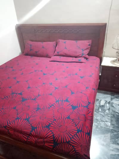 bed and bedroom chairs