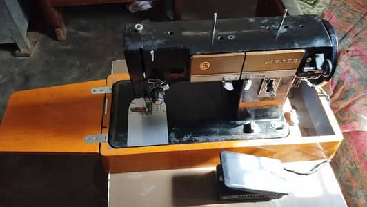 vintage original singer sewing machine with decorative stitch patterns