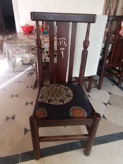 Dining table with six chairs available for sale