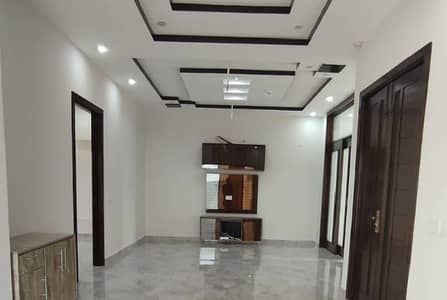 A Masterpiece Of Material & Design Modern 10 Marla Home With Two Company Kitchens & Premium Flooring In DHA Phase 5