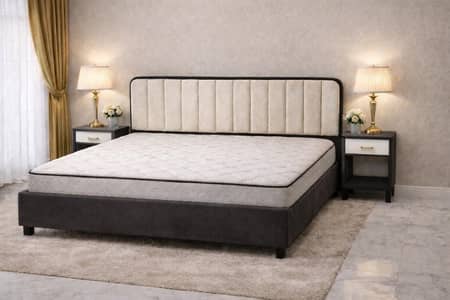 slightly used low profile bed with two side tables