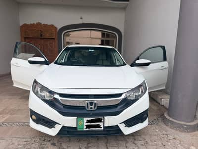 Honda civic oriel 8/10 condition everything works perfectly. . . .