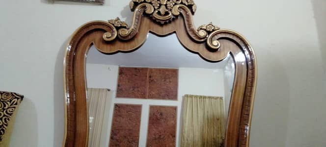 bed with 2 side tables and dressing