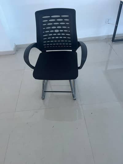 Office chairs tables and computers