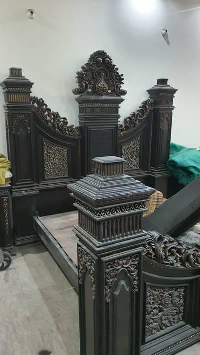 Carved wooden bed