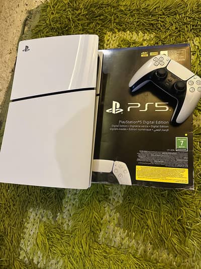 PlayStation 5 slim 1TB digital with Box 10/10 seal packwith free games