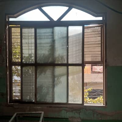 Iron window with glass made from heavy material