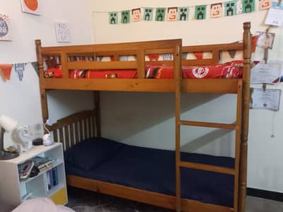 Wooden Bunk Beds with used mattress
