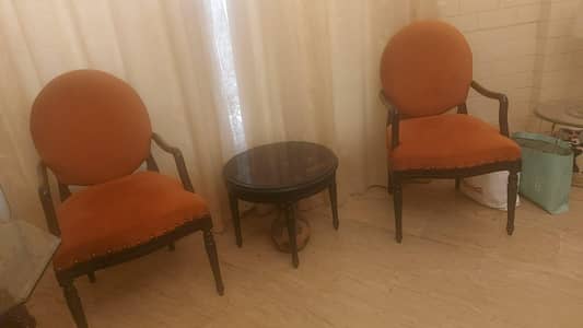 2 chairs and one coffee table