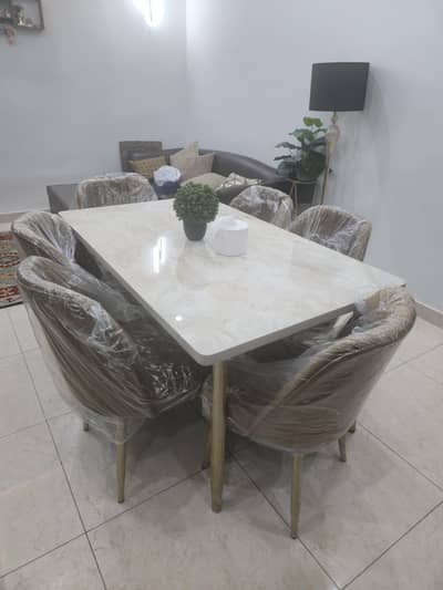 BRAND NEW DINNING TABLE AND SIX CHAIRS