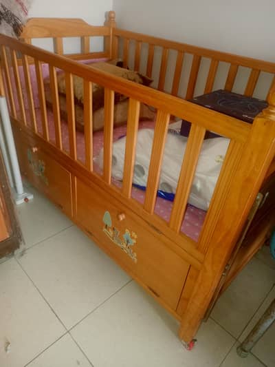solid wood baby cot in best condition
