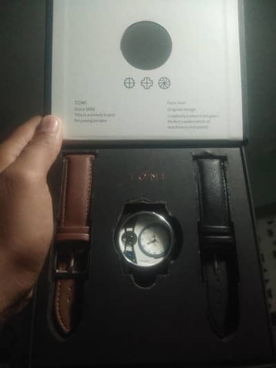 brand Tomi