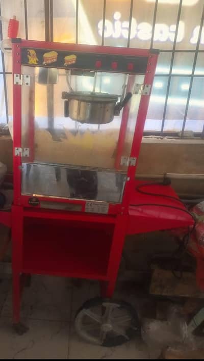 An electrical popcorn making machine.