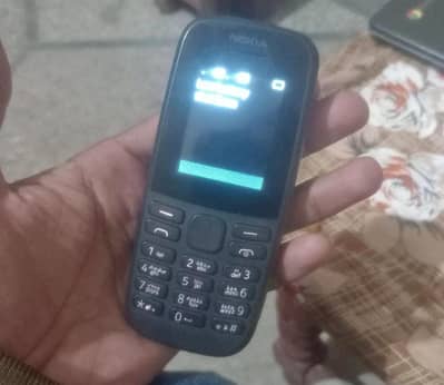 Nokia 106 ek realme 5i 64gb