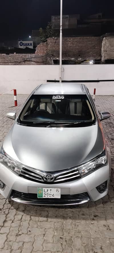corolla altis 2015 silver is like new