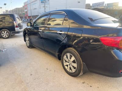 Toyota Gli 2009 black colour mannual