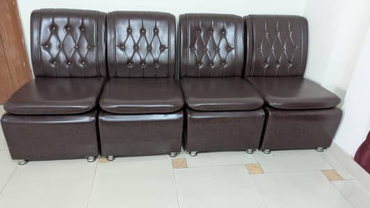 A set of 4 single seater sofa
