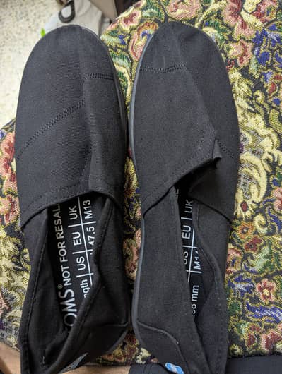 Brand New Toms black shoes