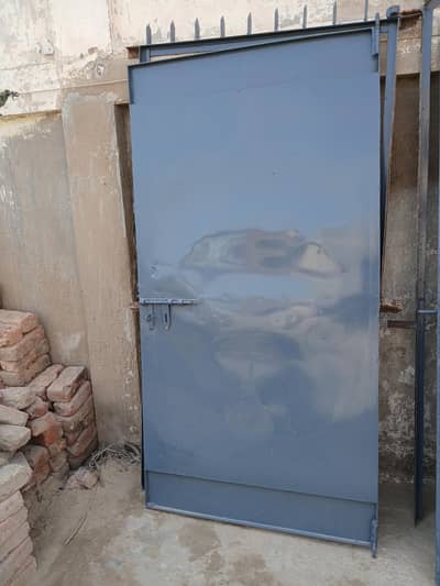 3 used iron doors and 2 used wooden doors for sale.