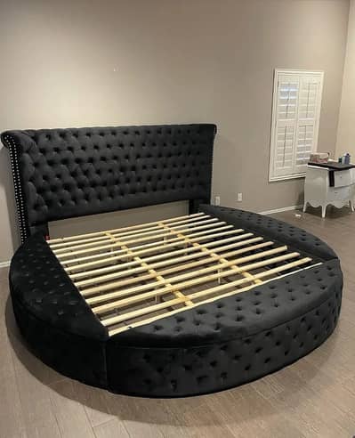 Round Black Master Bed with Storage
