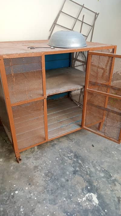 Hen cage made by solid iron in good condition.