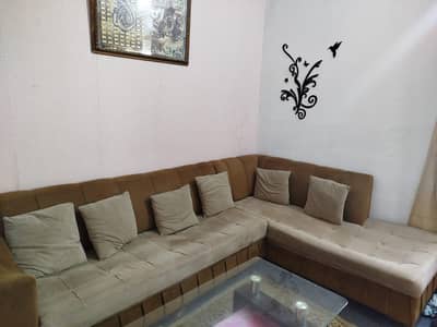 L shaped brown sofa set