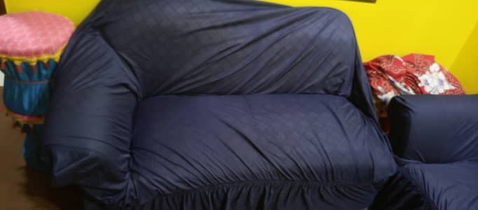 7 Seater sofa set and one table with two covers blue and brown