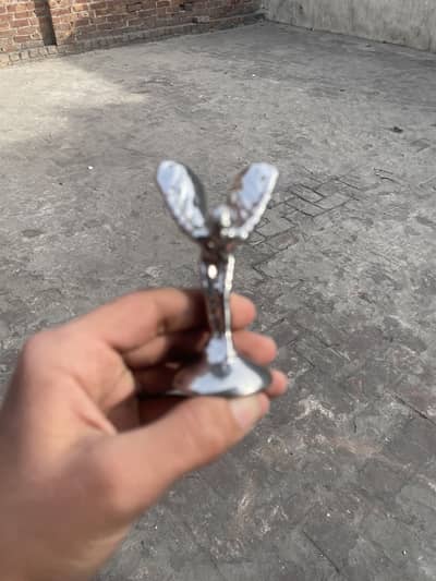 Rolls Royce statue of ester