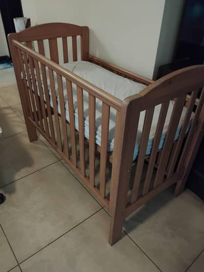 Mother care cot with mattress
