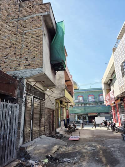 Shop and Flat for sale near Dhok syedan Chok Rwp