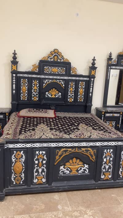 Wooden bed with two side tables r one dressing table