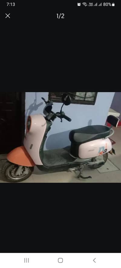 i m selling my evee nisa scooty