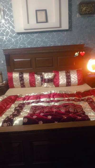 bed with 2 side tables and 1 dressing table