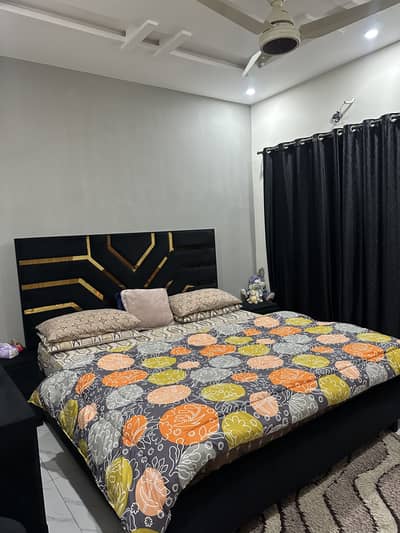 Black original velvet bed withside table a vanity with mirror