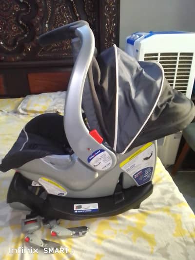 baby carry cot and car 