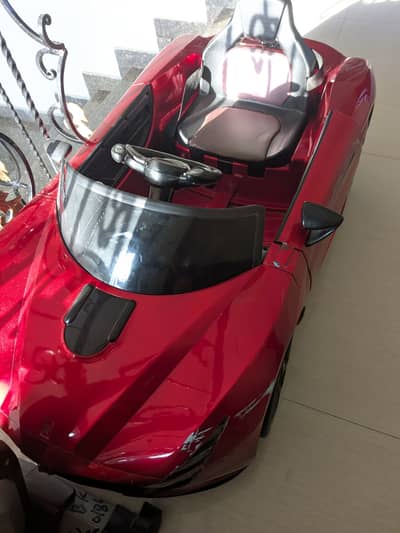 Kids car suitable for 2-5 years. 9/10 condition. Charger not availab.