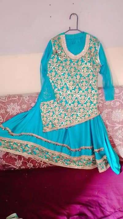 beautiful fancy dress with golden embroidery shirt and sharara