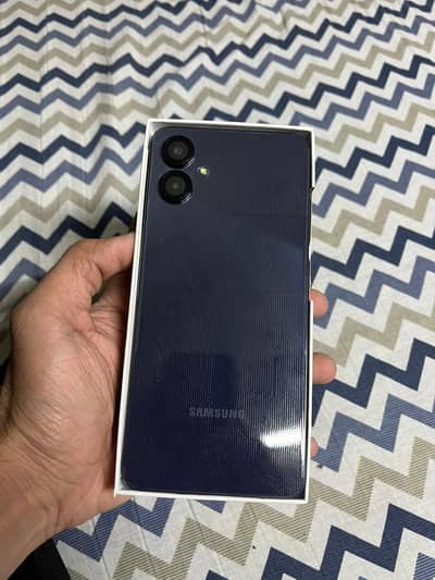 Samsung A06 and Iphone 11