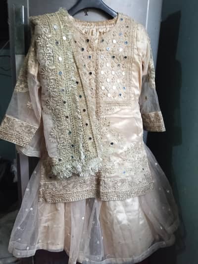 3 piece sharara golden color condition 10/10 size 10to12 yers old girl