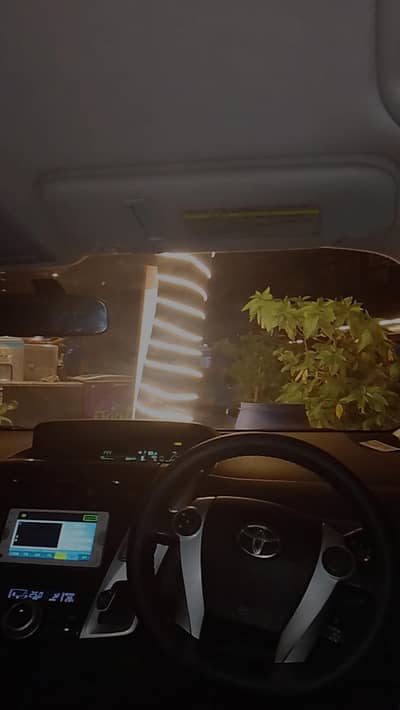 Toyota Prius alpha 2012 model (5 seater)