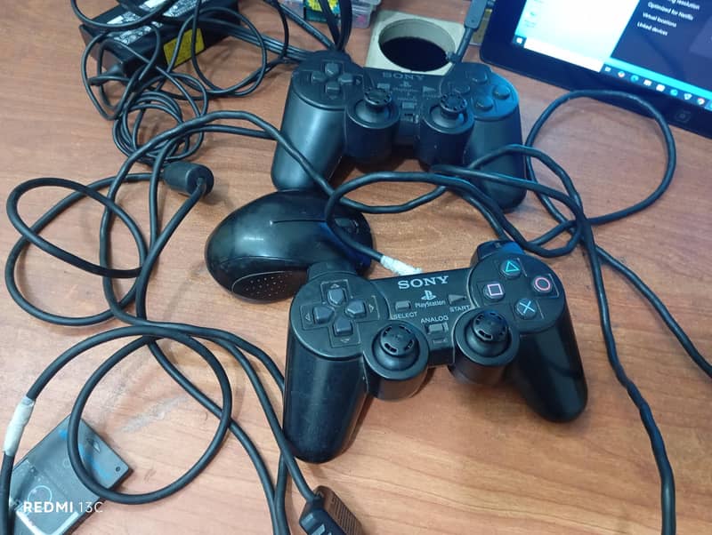 ps 2 with 2 controler 0