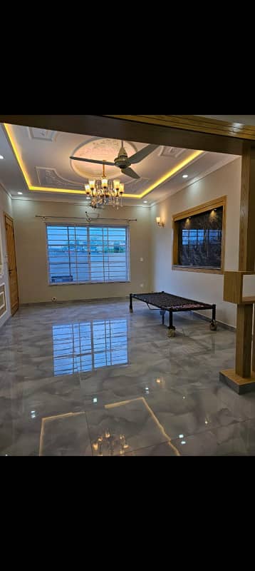 G-13 Tile Flooring 10 Marla Ground Portion Like A New House Near Metro Bus Station.