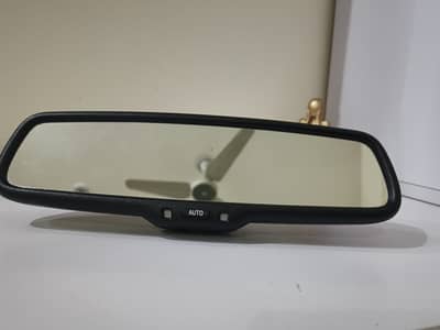 Auto-dimming rear mirror