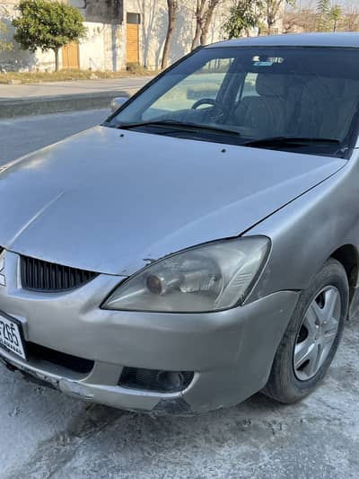 Mitsubishi Lancer  GlX